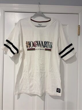 Warner Bros. White Tee with Multicolor Neck Stripe